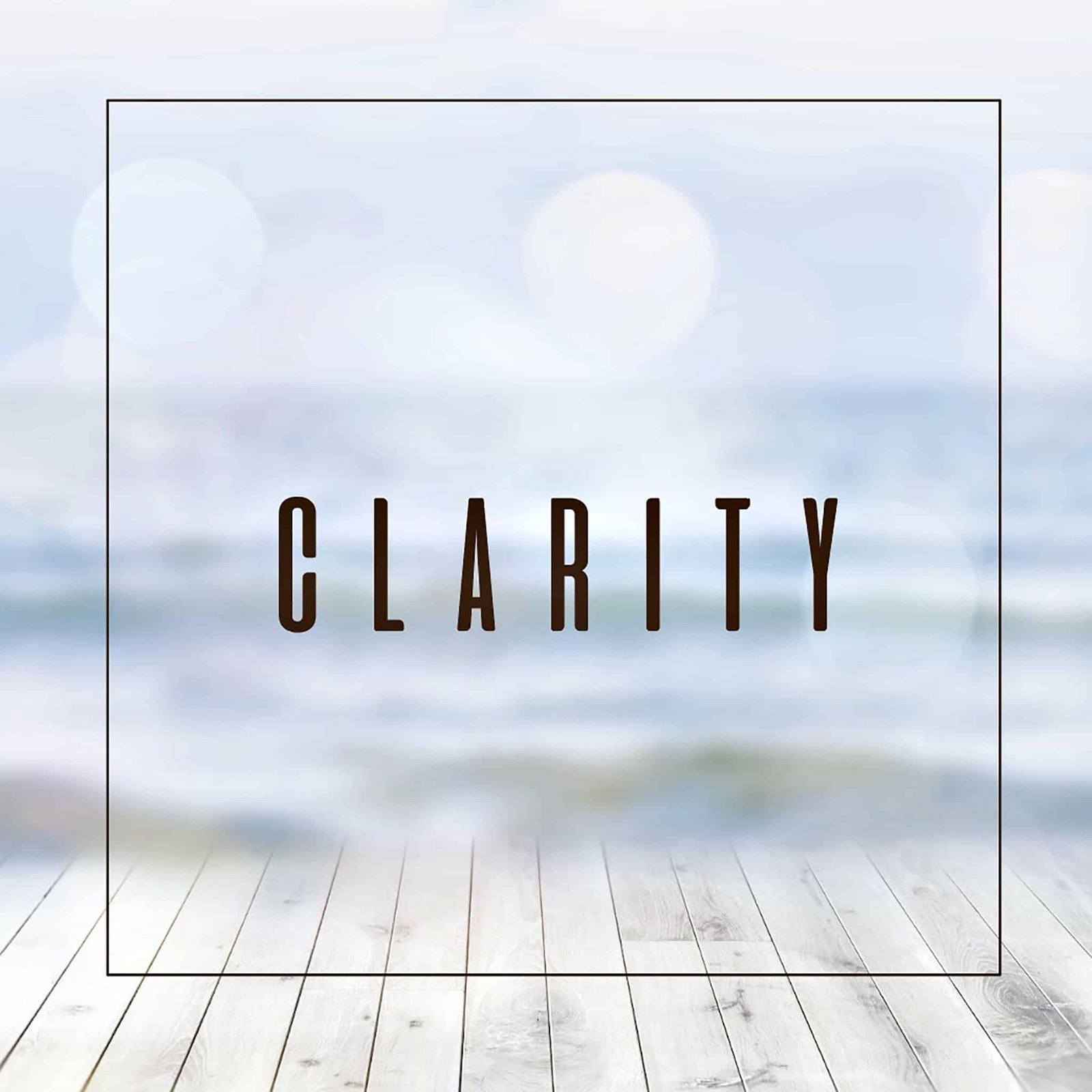 Blurred ocean view with 'Clarity' text overlay